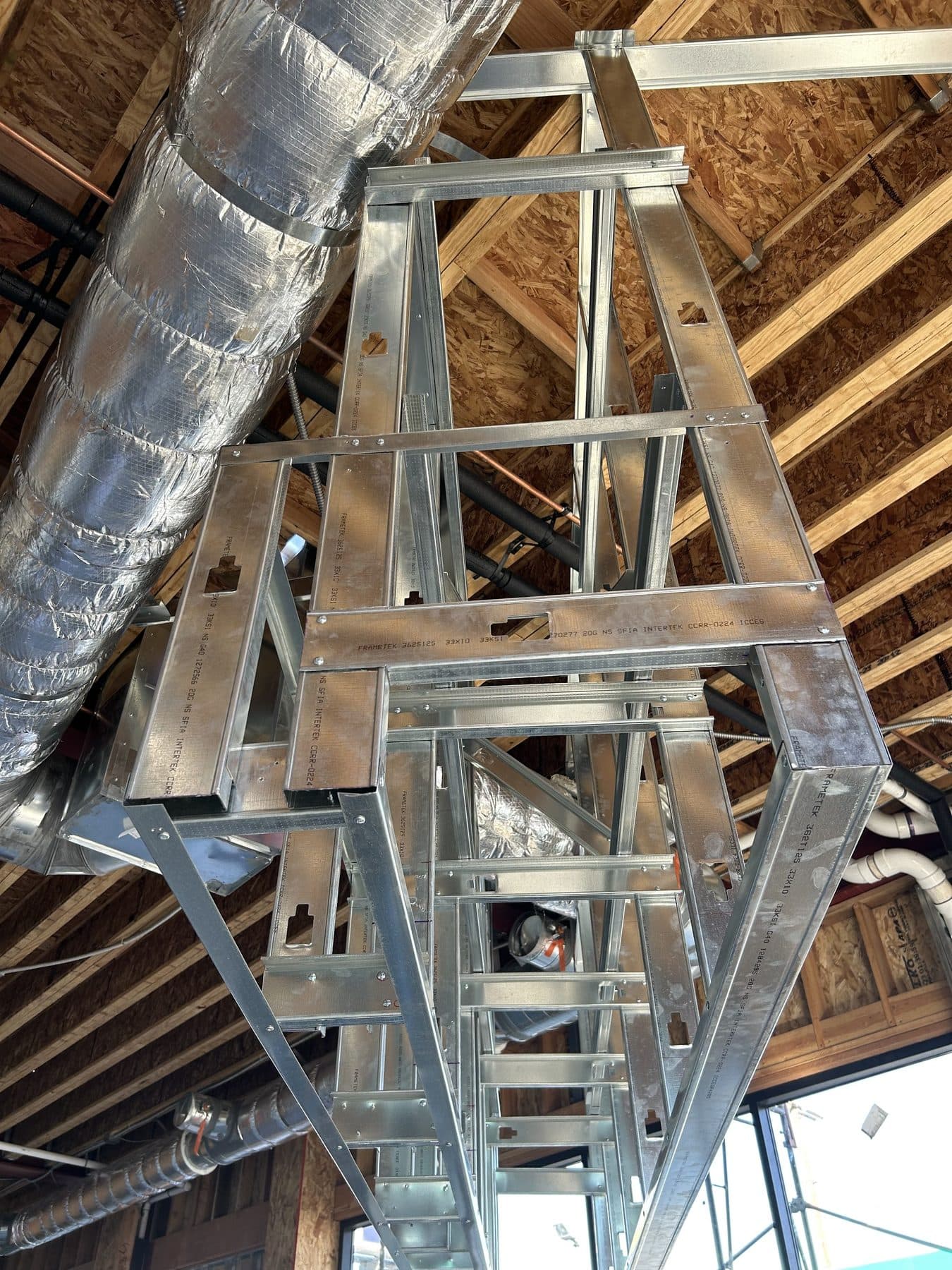 Steel studs and ductwork inside the Vanowen Street remodel.
