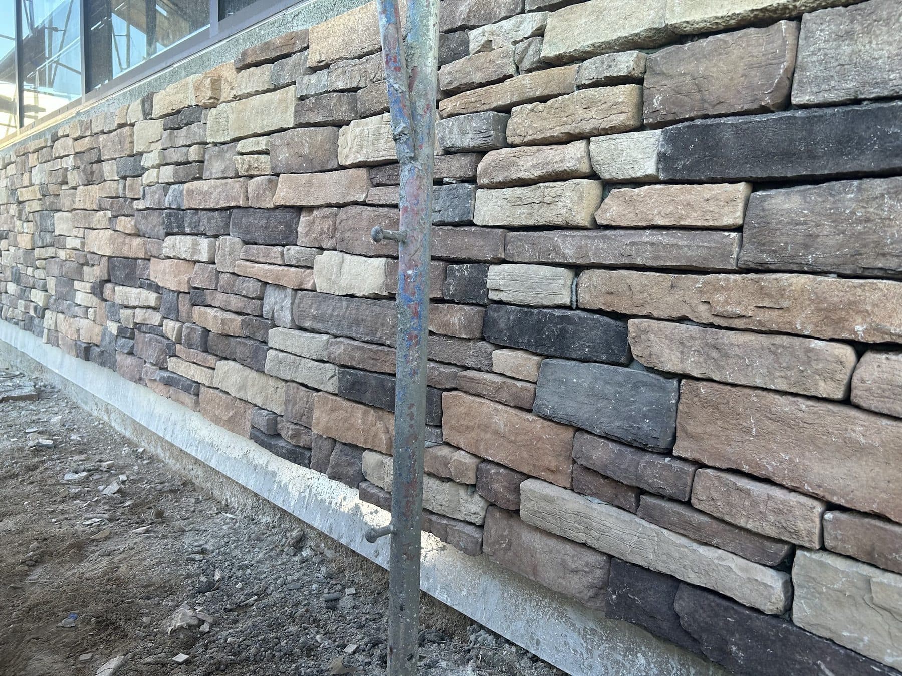 Stone veneer on an exterior wall at the Vanowen Street project.